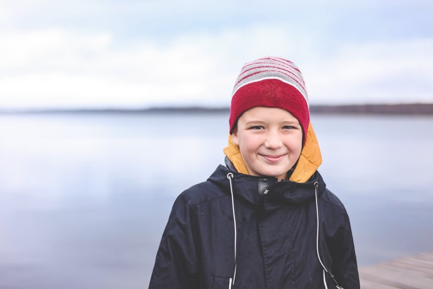 boy smiling after child therapy