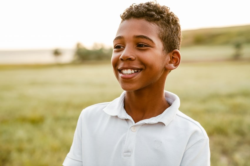 Boy smiling after solution-focused therapy